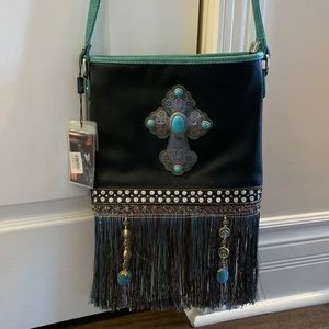 Black crossbody bag with fringe.  This is NWT.